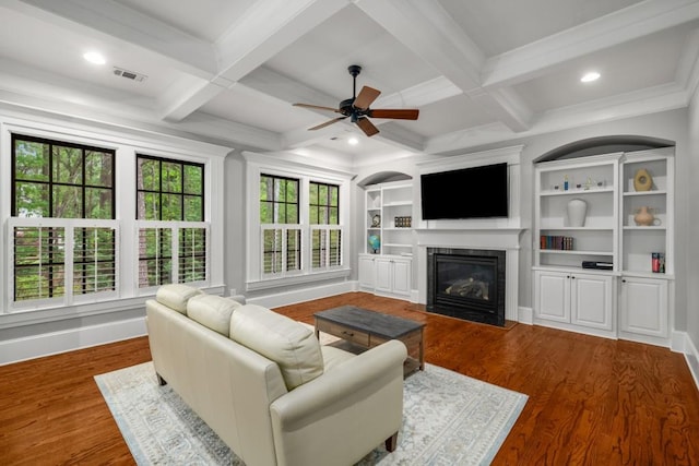 201 Hunley Ct, Alpharetta, GA 30005 - living area featuring a fireplace with flush hearth, baseboards, a ceiling fan, and wood finished floors