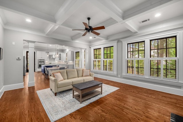 201 Hunley Ct, Alpharetta, GA 30005 - living room featuring coffered ceiling, a ceiling fan, baseboards, and decorative columns
