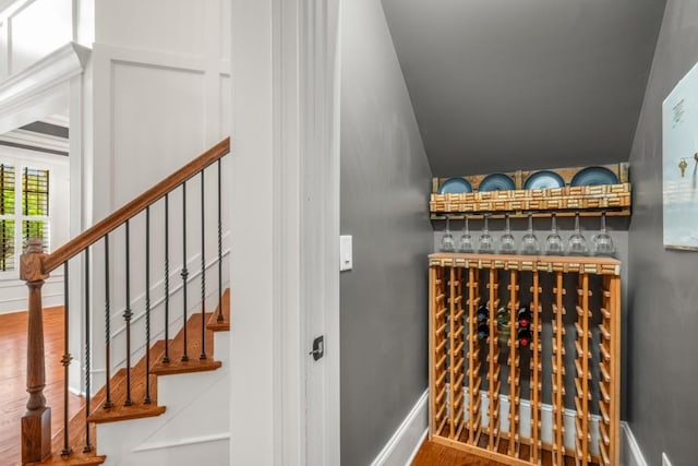 201 Hunley Ct, Alpharetta, GA 30005 - wine room featuring baseboards and wood finished floors
