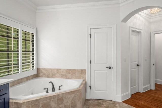 201 Hunley Ct, Alpharetta, GA 30005 - full bath featuring ornamental molding, vanity, and a jetted tub