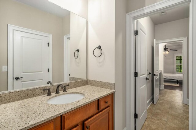 201 Hunley Ct, Alpharetta, GA 30005 - bathroom featuring vanity, tile patterned flooring, and ceiling fan