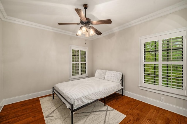 201 Hunley Ct, Alpharetta, GA 30005 - bedroom featuring wood finished floors, crown molding, baseboards, and multiple windows