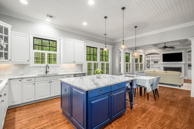 201 Hunley Ct, Alpharetta, GA 30005 - kitchen featuring blue cabinets, white cabinetry, and a sink