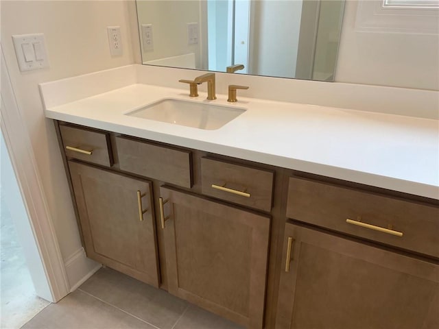 bathroom with vanity and tile patterned floors