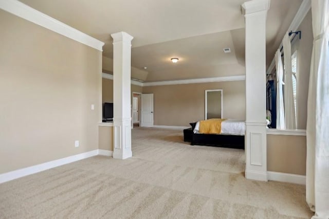 unfurnished bedroom featuring light colored carpet, ornamental molding, and decorative columns