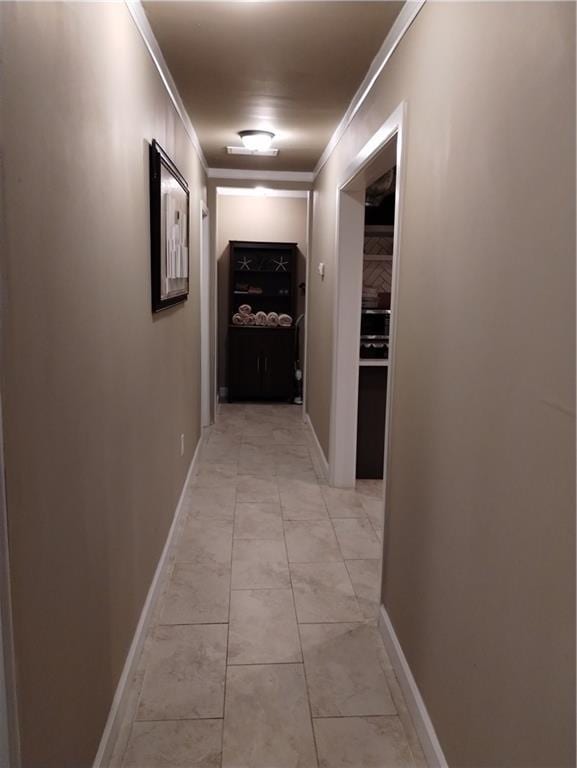 hallway with ornamental molding