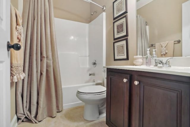 full bathroom with shower / tub combo, vanity, tile patterned floors, and toilet