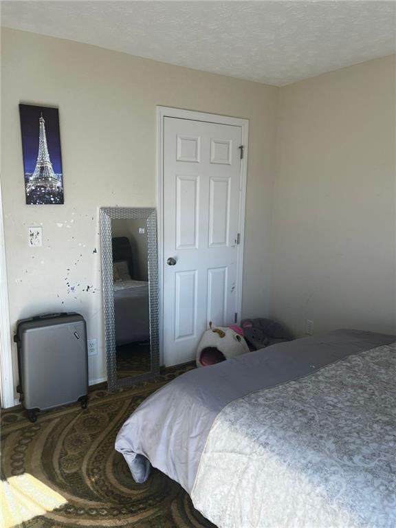 bedroom with a textured ceiling