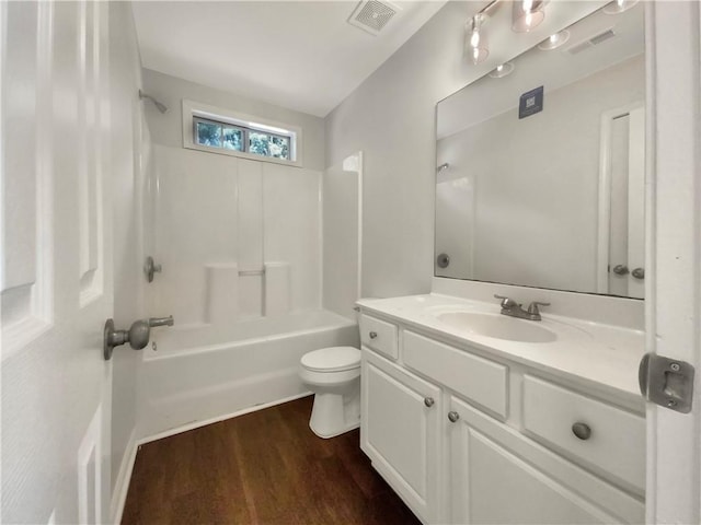 full bathroom with wood-type flooring, vanity, toilet, and shower / bath combination