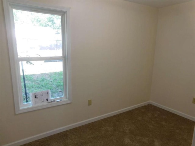 476 W Franklin St, Toccoa, GA 30577 - carpeted empty room with healthy amount of natural light