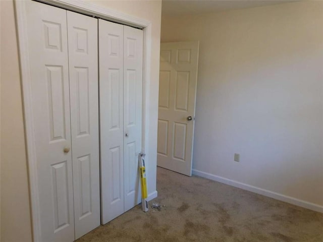476 W Franklin St, Toccoa, GA 30577 - unfurnished bedroom with carpet flooring and a closet