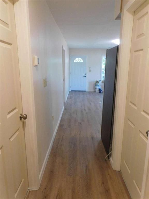 476 W Franklin St, Toccoa, GA 30577 - hallway featuring wood finished floors and baseboards