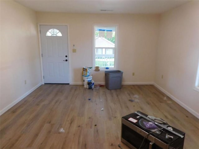 476 W Franklin St, Toccoa, GA 30577 - entrance foyer featuring wood finished floors and baseboards