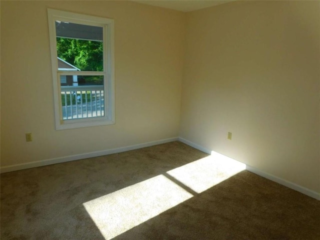 476 W Franklin St, Toccoa, GA 30577 - spare room featuring carpet floors and baseboards