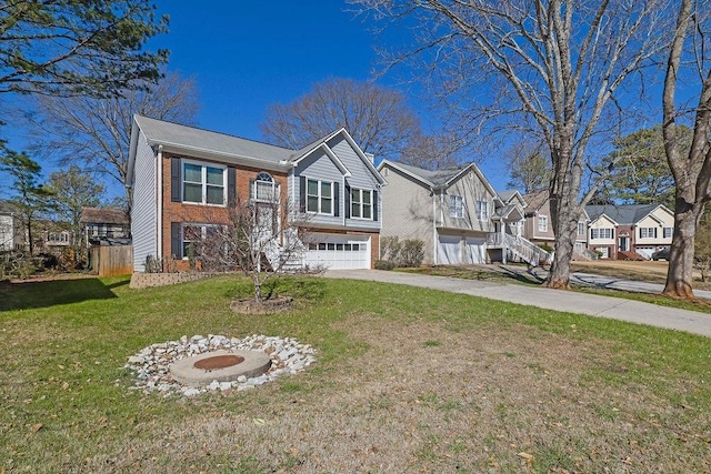 view of front of home with a garage, brick siding, concrete driveway, a residential view, and a front lawn