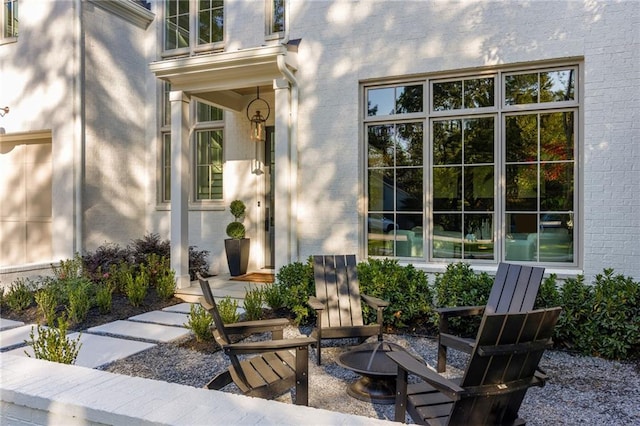 view of patio featuring a fire pit