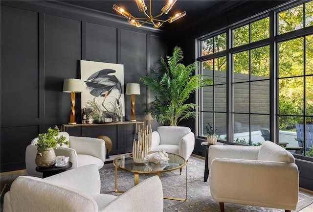 interior space featuring a decorative wall and a notable chandelier