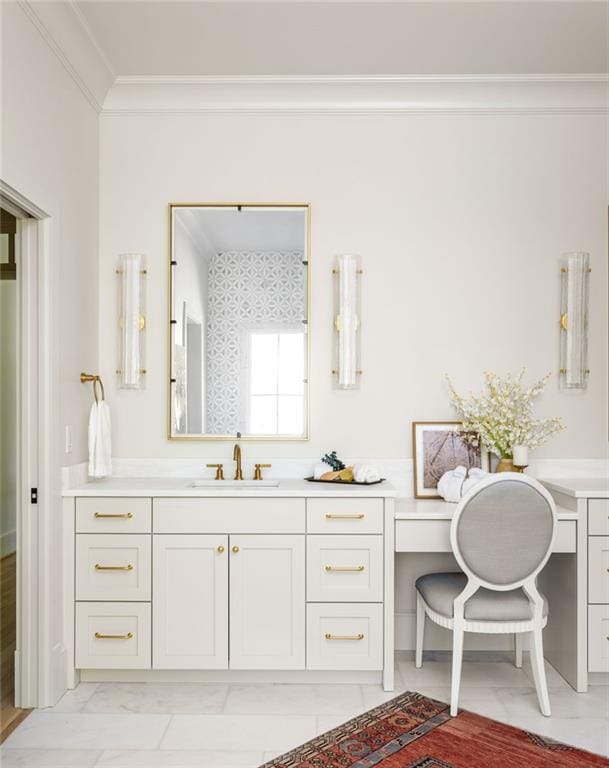 full bath featuring ornamental molding, vanity, and marble finish floor