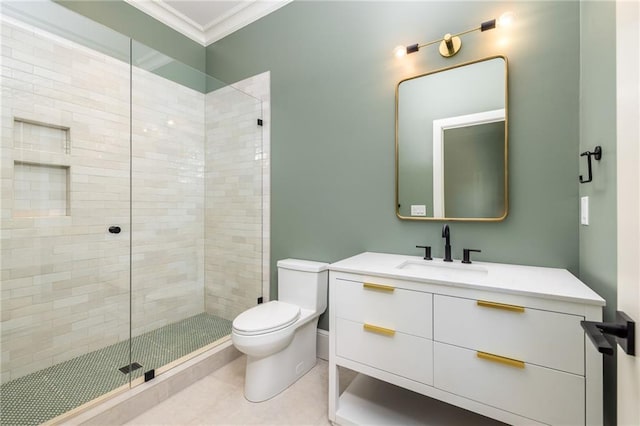 bathroom with toilet, ornamental molding, vanity, and a shower stall