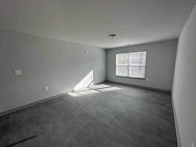 empty room featuring hardwood / wood-style flooring