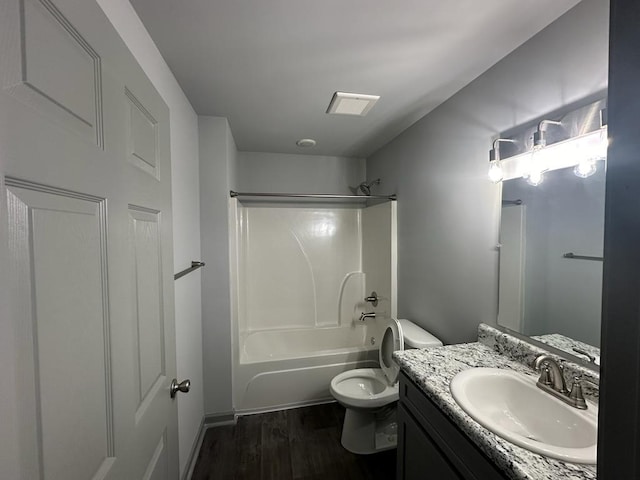 full bathroom featuring toilet, vanity, bathtub / shower combination, and wood-type flooring