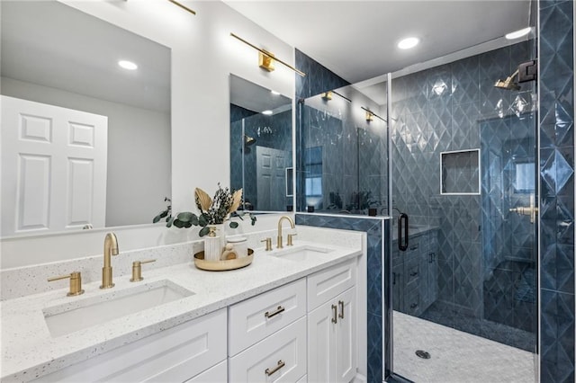 bathroom with vanity and an enclosed shower