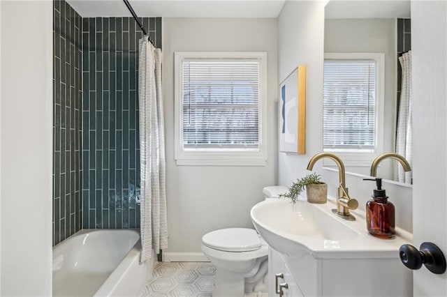 full bathroom featuring shower / tub combo, vanity, toilet, and tile patterned flooring