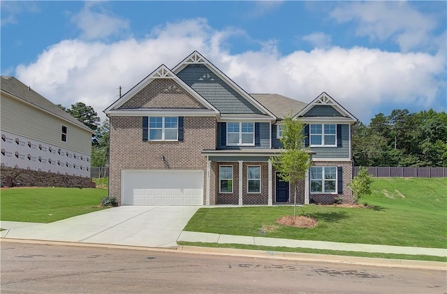 craftsman inspired home featuring a front lawn and a garage