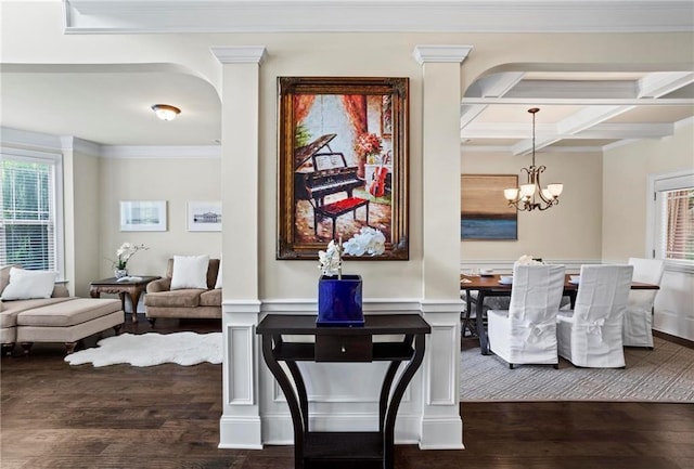 dining room featuring crown molding, coffered ceiling, dark wood-style flooring, and beamed ceiling