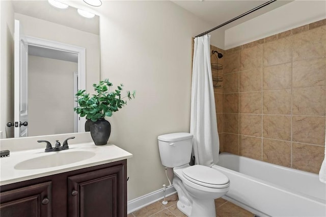 bathroom featuring baseboards, toilet, tile patterned floors, shower / bath combination with curtain, and vanity