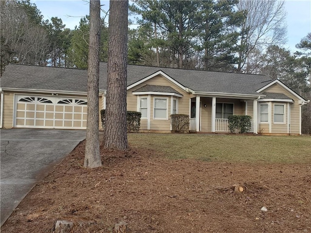 single story home featuring a garage and a front yard