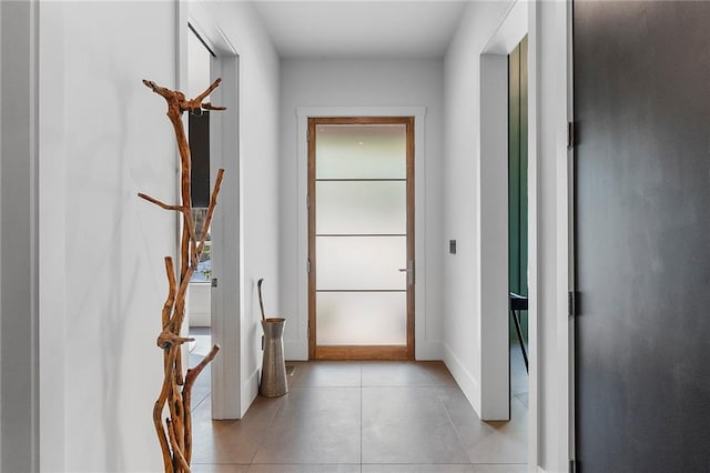 hallway with light tile patterned flooring