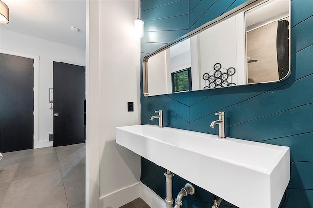 bathroom with tile patterned floors