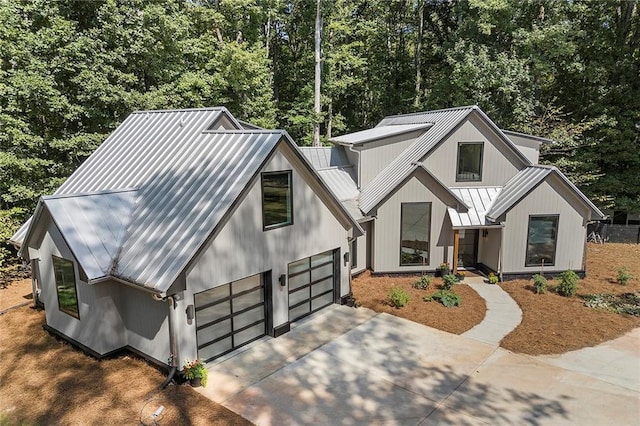 modern farmhouse style home with a garage