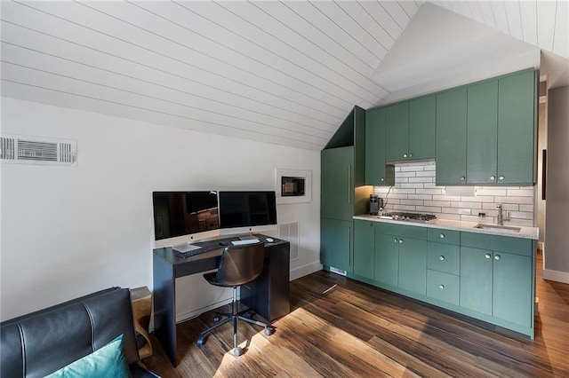 home office with vaulted ceiling, sink, and dark hardwood / wood-style flooring