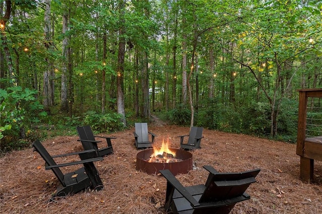 exterior space featuring an outdoor fire pit