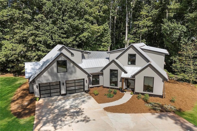 modern farmhouse style home with a garage