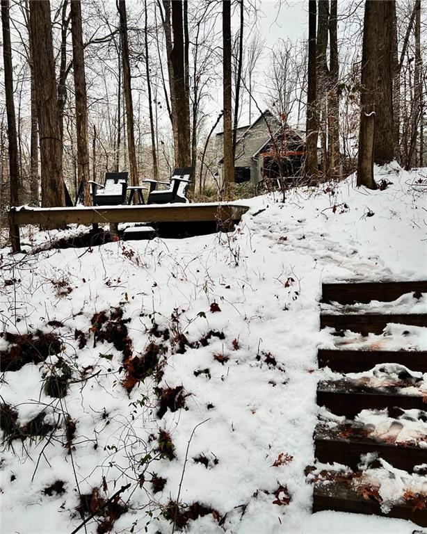 view of yard layered in snow