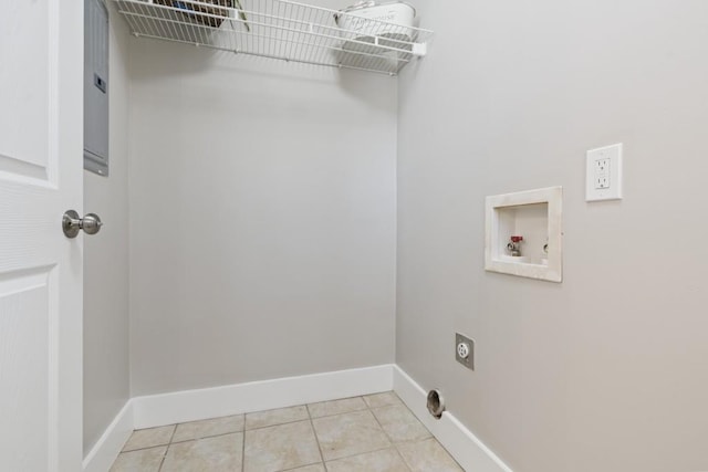 clothes washing area with electric dryer hookup, light tile patterned floors, and hookup for a washing machine