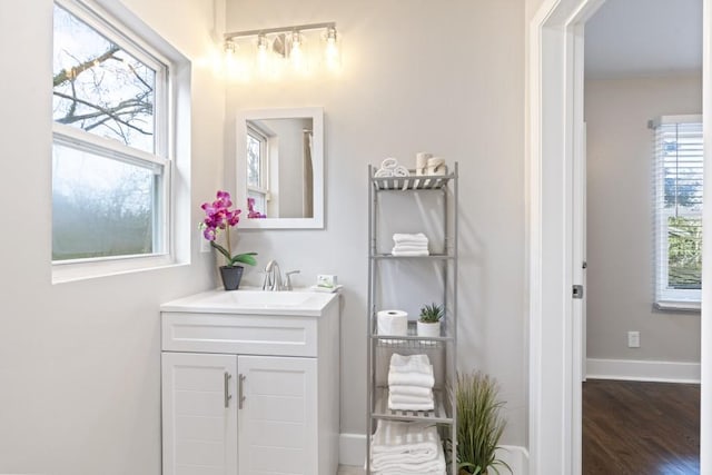 bathroom featuring vanity and wood-type flooring