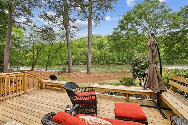 deck featuring a water view