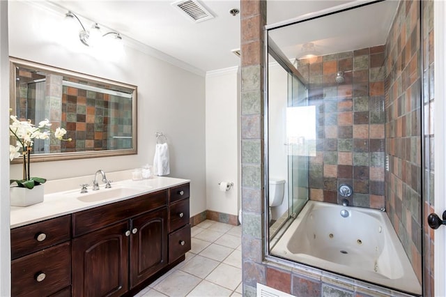 bathroom featuring vanity, baseboards, visible vents, tile patterned floors, and crown molding