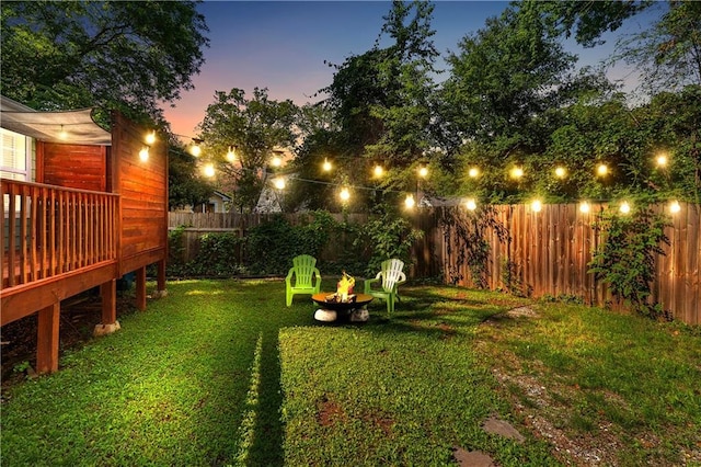 1518 Langston Ave SW, Atlanta, GA 30310 - fenced backyard with a fire pit and a wooden deck