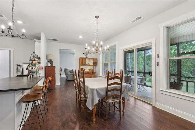 411 Johnson Rd, Locust Grove, GA 30248 - dining area with a chandelier, dark wood-style floors, and recessed lighting