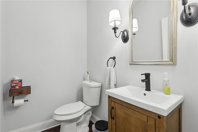 411 Johnson Rd, Locust Grove, GA 30248 - half bath featuring vanity and toilet