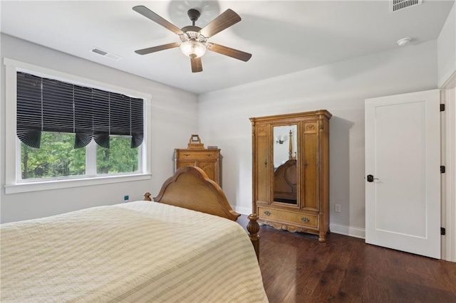 411 Johnson Rd, Locust Grove, GA 30248 - bedroom featuring dark wood-style floors and ceiling fan