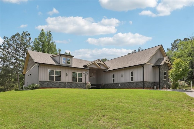411 Johnson Rd, Locust Grove, GA 30248 - craftsman inspired home with a front lawn, stone siding, and roof with shingles