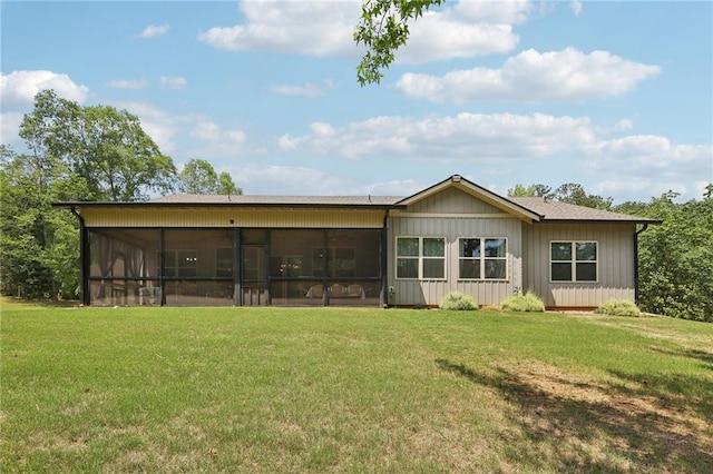 411 Johnson Rd, Locust Grove, GA 30248 - back of house with a yard and a sunroom