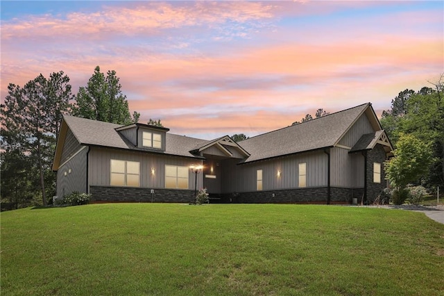 411 Johnson Rd, Locust Grove, GA 30248 - view of front of property with a lawn, stone siding, and roof with shingles