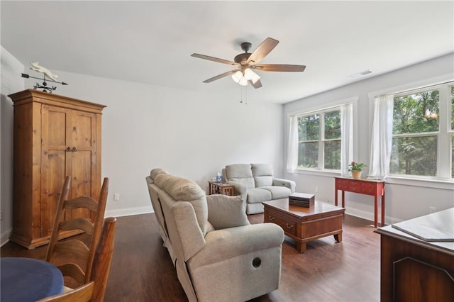 411 Johnson Rd, Locust Grove, GA 30248 - living room featuring ceiling fan and dark wood-type flooring